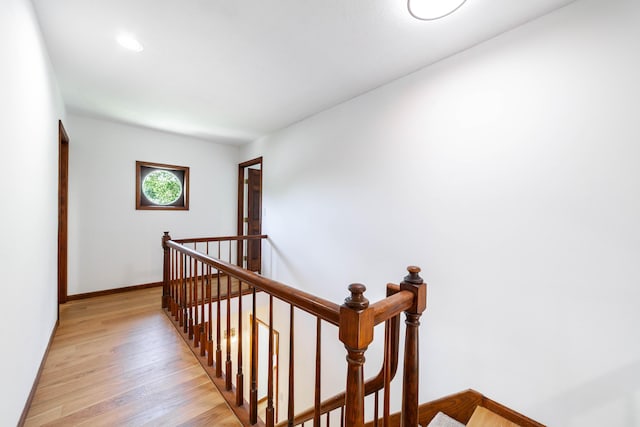 3112 Crestwood Ln, Columbia, MO 65203 - hallway featuring an upstairs landing and light wood-style flooring