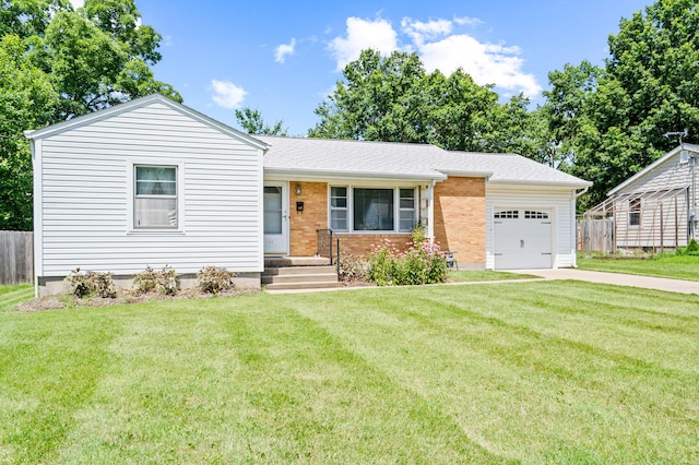 709 Clayton St, Columbia, MO 65203 - view of front of house featuring a garage, driveway, brick siding, and a shingled roof