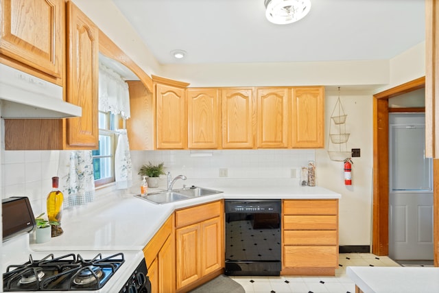 709 Clayton St, Columbia, MO 65203 - kitchen featuring white range with gas stovetop, black dishwasher, under cabinet range hood, and decorative backsplash