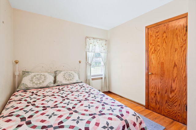 709 Clayton St, Columbia, MO 65203 - bedroom featuring wood finished floors