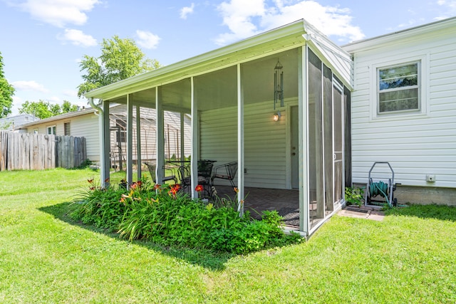 709 Clayton St, Columbia, MO 65203 - view of outdoor structure featuring a sunroom