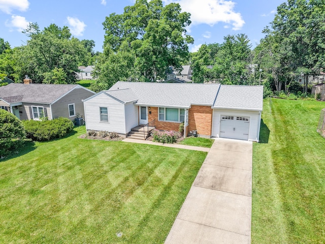709 Clayton St, Columbia, MO 65203 - view of front of house with a garage, concrete driveway, a front yard, roof with shingles, and brick siding