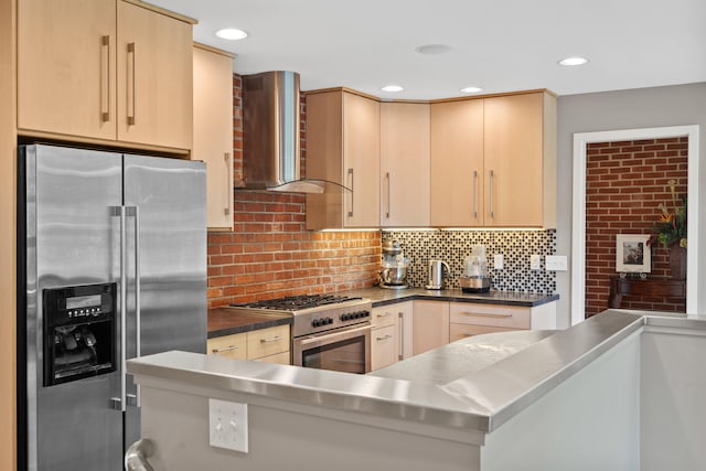 702 Russell Blvd, Columbia, MO 65203 - kitchen with high quality appliances, stainless steel countertops, wall chimney exhaust hood, light brown cabinets, and backsplash