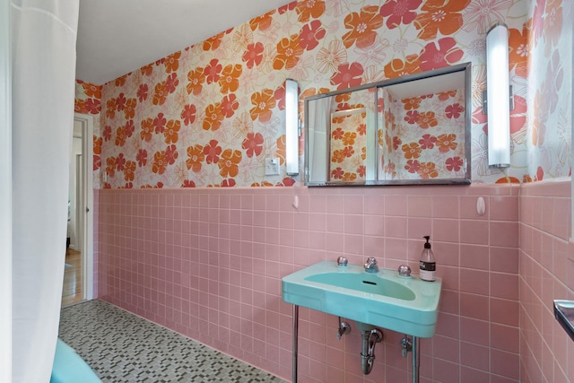702 Russell Blvd, Columbia, MO 65203 - bathroom with wallpapered walls, wainscoting, and tile walls