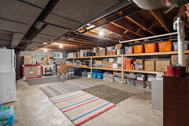 702 Russell Blvd, Columbia, MO 65203 - unfinished below grade area with freestanding refrigerator