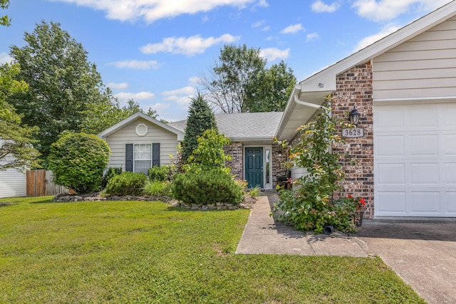 3628 Lupine Dr, Columbia, MO 65201 - ranch-style home with concrete driveway, a garage, and brick siding