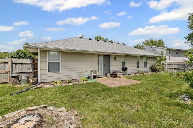 3628 Lupine Dr, Columbia, MO 65201 - back of property featuring a patio area and a shingled roof