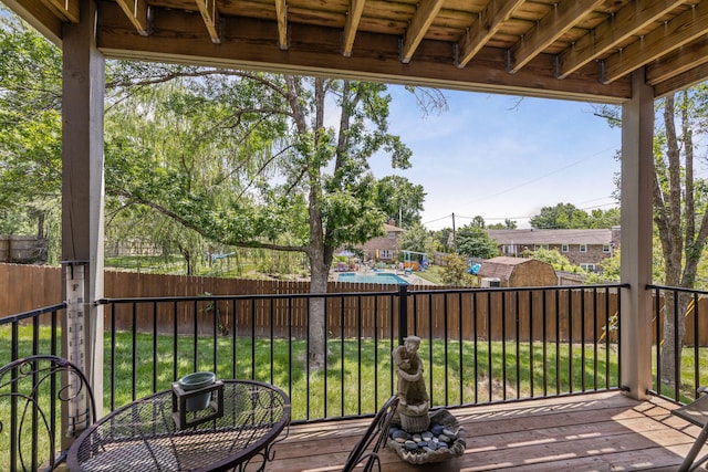 2710 Rollins Rd Unit A-1, Columbia, MO 65203 - wooden deck with a fenced backyard