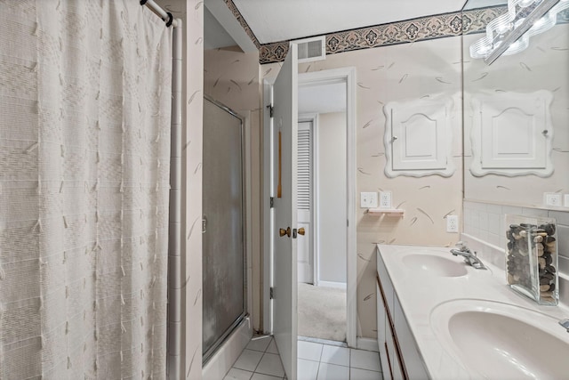 2710 Rollins Rd Unit A-1, Columbia, MO 65203 - bathroom featuring a shower with curtain, tile patterned floors, and double vanity