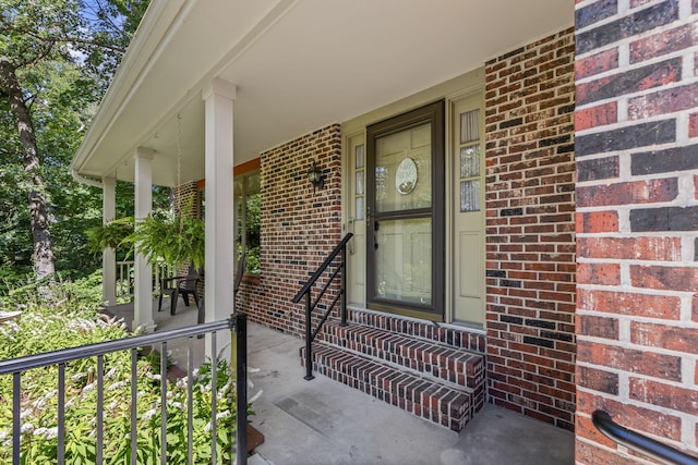 3707 Woodridge Ct, Columbia, MO 65201 - entrance to property with brick siding and a porch