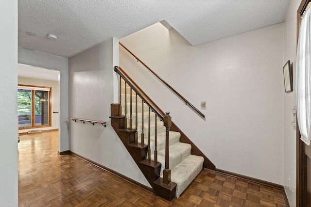 3707 Woodridge Ct, Columbia, MO 65201 - stairs with baseboards and a textured ceiling