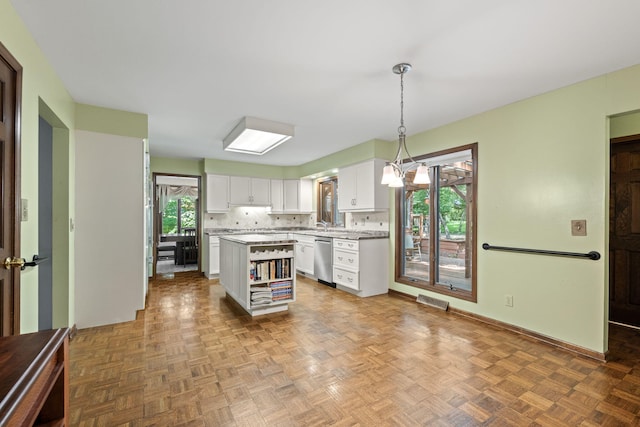 3707 Woodridge Ct, Columbia, MO 65201 - kitchen with dishwasher, white cabinets, light countertops, a center island, and open shelves