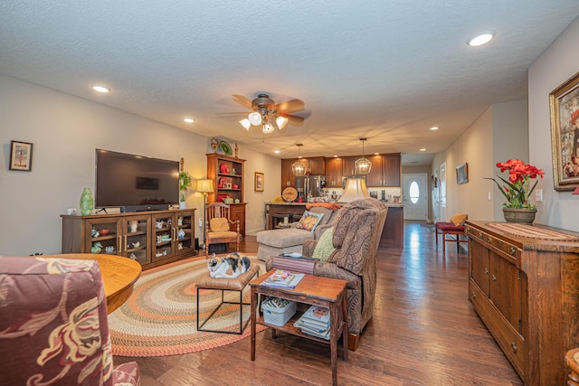 1331 Lantern Pointe Dr, Moberly, MO 65270 - living room featuring a ceiling fan, recessed lighting, dark wood-type flooring, and a textured ceiling