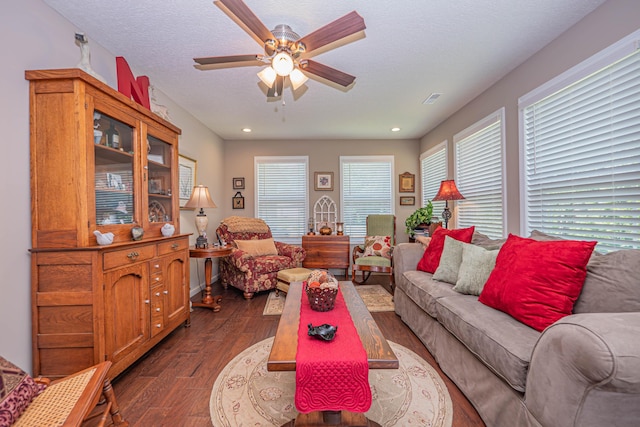 1331 Lantern Pointe Dr, Moberly, MO 65270 - living area featuring dark wood finished floors, ceiling fan, and recessed lighting