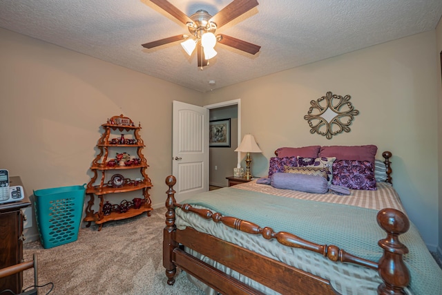 1331 Lantern Pointe Dr, Moberly, MO 65270 - carpeted bedroom featuring a textured ceiling and ceiling fan