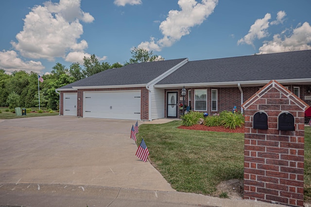 1331 Lantern Pointe Dr, Moberly, MO 65270 - single story home with an attached garage, brick siding, concrete driveway, a front yard, and a shingled roof