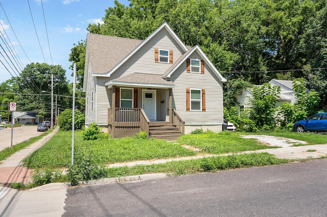 1101 Pannell St, Columbia, MO 65201 - bungalow with covered porch and a shingled roof