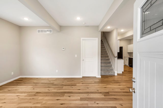 1101 Pannell St, Columbia, MO 65201 - empty room with light wood-style floors, stairs, and recessed lighting