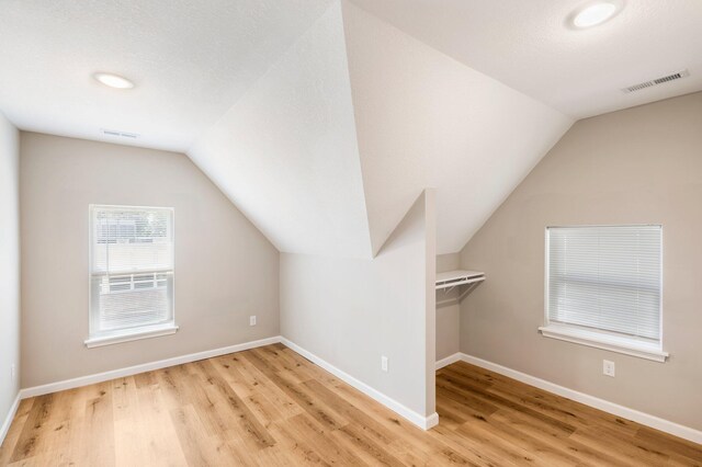 1101 Pannell St, Columbia, MO 65201 - additional living space featuring lofted ceiling and wood finished floors