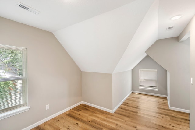 1101 Pannell St, Columbia, MO 65201 - additional living space featuring vaulted ceiling and light wood-style flooring