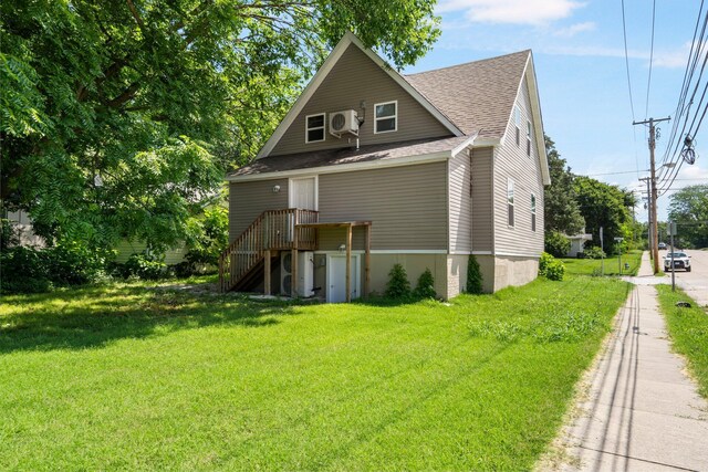 1101 Pannell St, Columbia, MO 65201 - view of front of house featuring roof with shingles and a front lawn