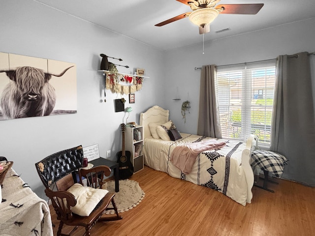 307 Jameson Dr, Ashland, MO 65010 - bedroom with wood finished floors and a ceiling fan