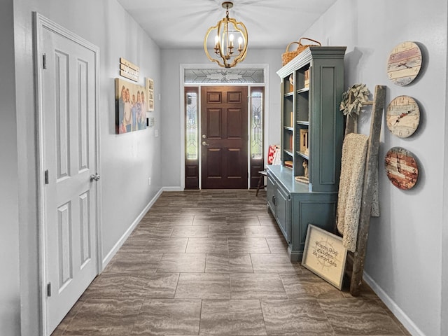 307 Jameson Dr, Ashland, MO 65010 - entrance foyer with a chandelier and baseboards