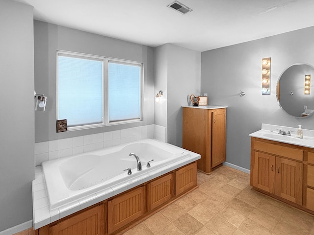 307 Jameson Dr, Ashland, MO 65010 - bathroom featuring vanity and a jetted tub