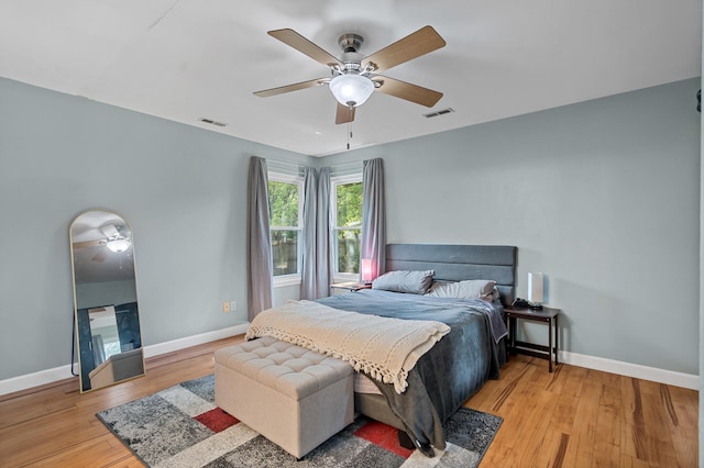 547 E Clearview Dr, Columbia, MO 65202 - bedroom with light wood-style floors and ceiling fan
