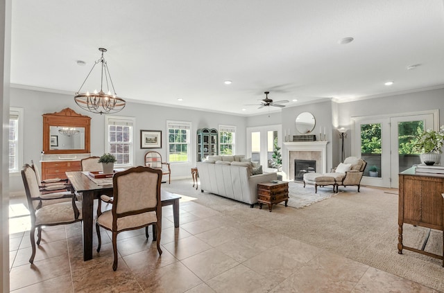 4106 Fritz Ct, Columbia, MO 65203 - dining area featuring recessed lighting, ornamental molding, a chandelier, a glass covered fireplace, and ceiling fan