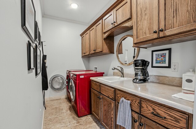 4106 Fritz Ct, Columbia, MO 65203 - laundry room featuring independent washer and dryer, ornamental molding, and cabinet space