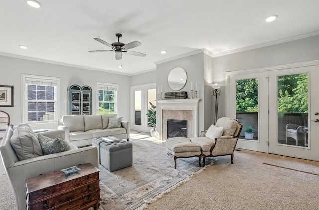 4106 Fritz Ct, Columbia, MO 65203 - living area featuring a tiled fireplace, crown molding, ceiling fan, and recessed lighting