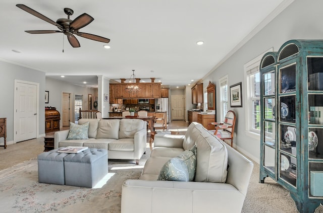 4106 Fritz Ct, Columbia, MO 65203 - living room with crown molding, recessed lighting, plenty of natural light, ceiling fan, and ornate columns