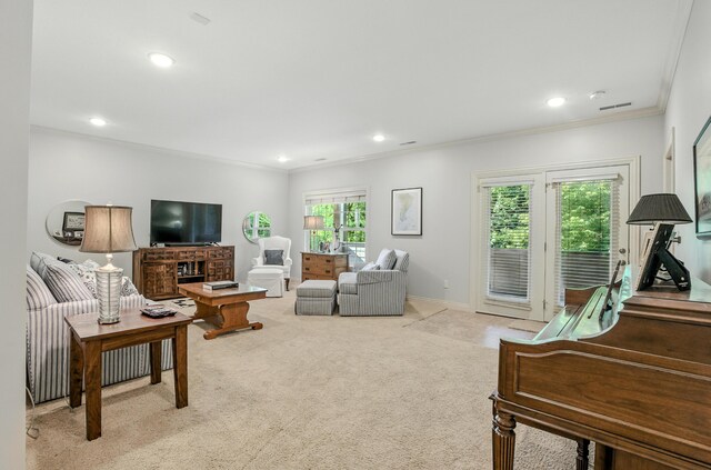 4106 Fritz Ct, Columbia, MO 65203 - living room with crown molding, light carpet, and recessed lighting