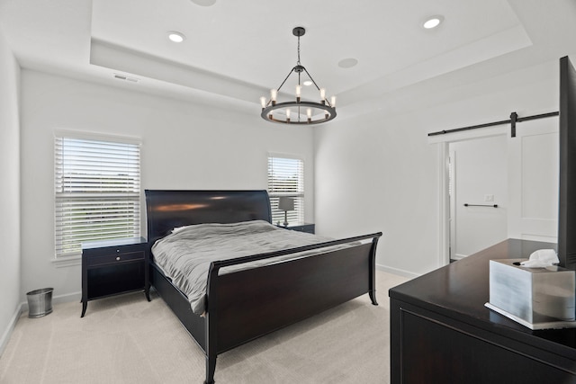 7405 Brackenhill Dr, Columbia, MO 65203 - bedroom with a raised ceiling, light carpet, a barn door, a chandelier, and recessed lighting