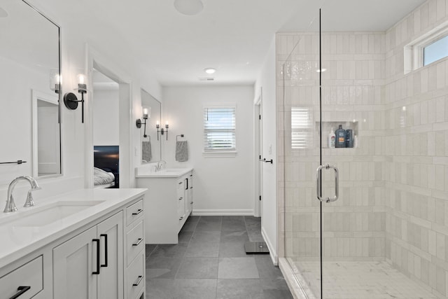 7405 Brackenhill Dr, Columbia, MO 65203 - ensuite bathroom with two vanities, a shower stall, and tile patterned floors