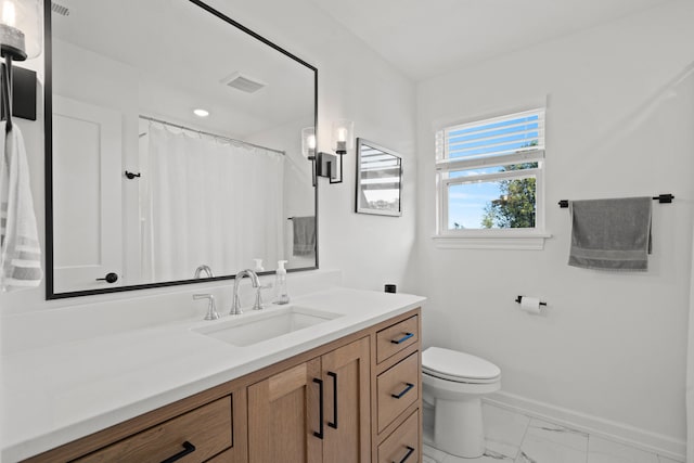 7405 Brackenhill Dr, Columbia, MO 65203 - bathroom featuring marble finish floors and vanity