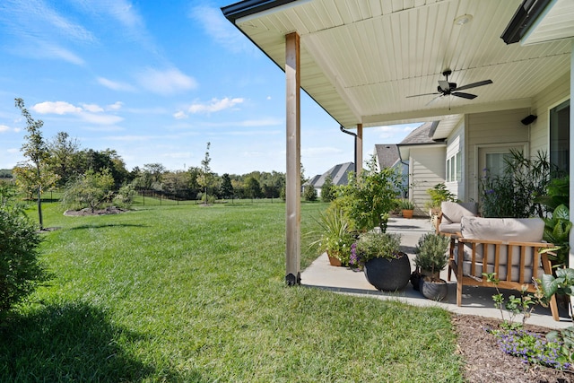 7405 Brackenhill Dr, Columbia, MO 65203 - view of green lawn with ceiling fan and a patio area
