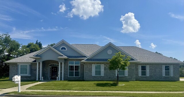 3824 Canyon Ridge Dr, Columbia, MO 65202 - view of front of home with a front yard and brick siding