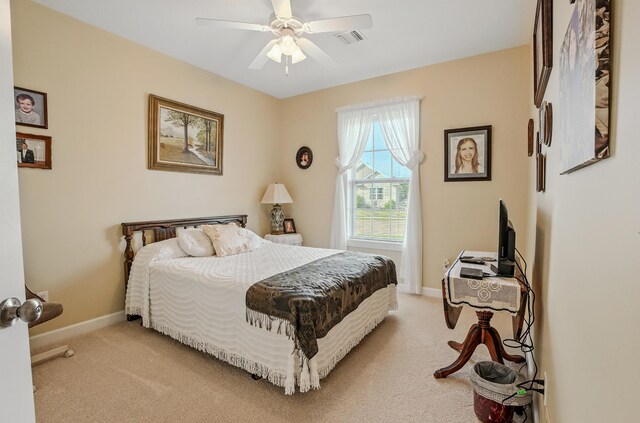 3824 Canyon Ridge Dr, Columbia, MO 65202 - bedroom featuring light colored carpet and a ceiling fan