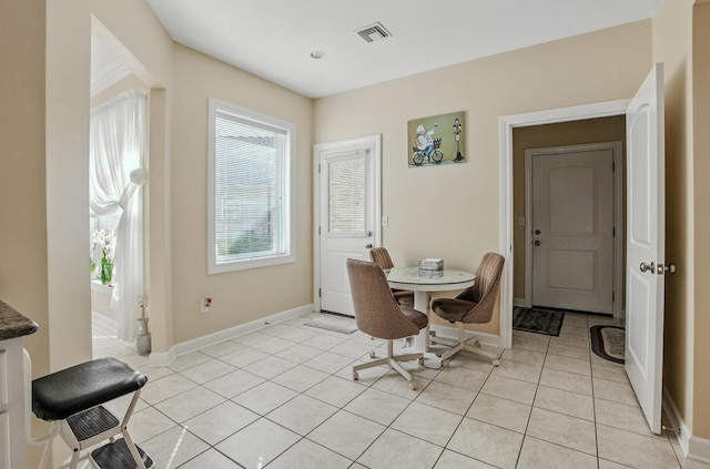 3824 Canyon Ridge Dr, Columbia, MO 65202 - dining space with light tile patterned floors and baseboards
