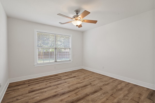 3106 Crabapple Ln, Columbia, MO 65203 - empty room with wood finished floors and ceiling fan