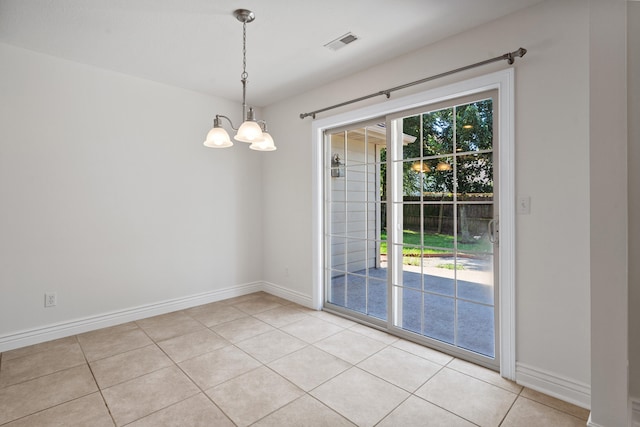 3106 Crabapple Ln, Columbia, MO 65203 - empty room featuring light tile patterned floors and a chandelier