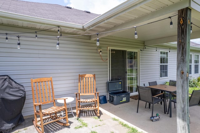 3810 Crocodile Dr, Columbia, MO 65202 - view of patio with outdoor dining area and a grill