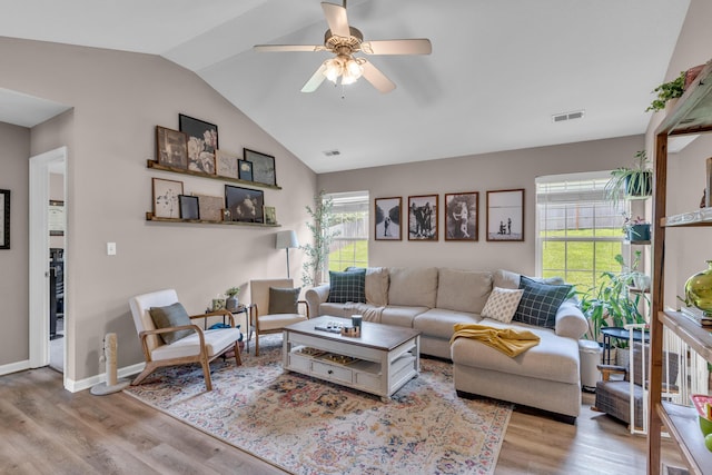 3810 Crocodile Dr, Columbia, MO 65202 - living area featuring wood finished floors, lofted ceiling, and ceiling fan