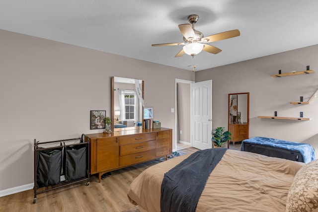 3810 Crocodile Dr, Columbia, MO 65202 - bedroom featuring light wood-style floors and a ceiling fan