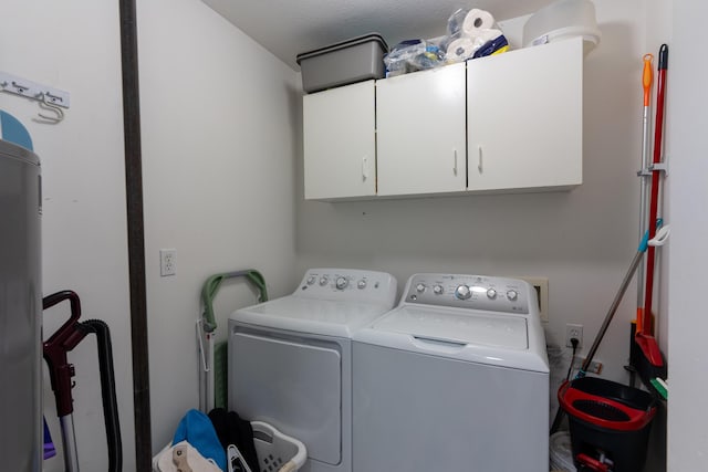 3810 Crocodile Dr, Columbia, MO 65202 - washroom featuring cabinet space and washer and dryer