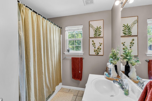 3810 Crocodile Dr, Columbia, MO 65202 - full bath featuring tile patterned flooring, vanity, and a shower with shower curtain