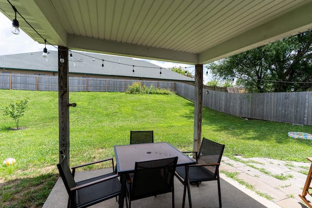 3810 Crocodile Dr, Columbia, MO 65202 - fenced backyard featuring a patio area and outdoor dining space