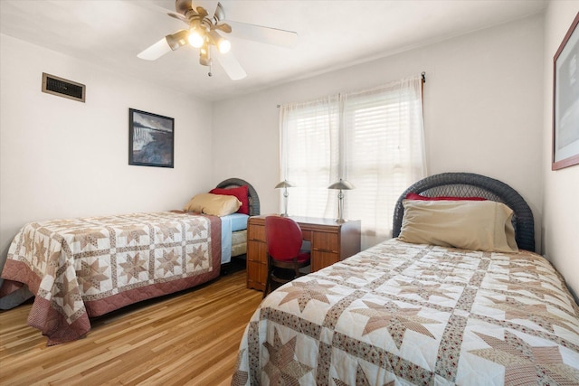 201 Ruby Ln, Columbia, MO 65203 - bedroom with wood finished floors and ceiling fan